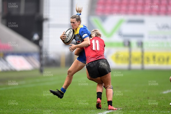 080326 - Brython Thunder v Gwalia Lightning - Celtic Challenge - Courtney Greenway of Gwalia Lightning is challenged by Seren Singleton of Brython Thunder