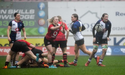 210226 - Brython Thunder v Wolfhounds - Celtic Challenge - Brython scrum-half, Seren Lockwood passes to the centres after a ruck
