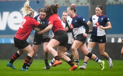210226 - Brython Thunder v Wolfhounds - Celtic Challenge - Wolfhounds, Niamh Marlrey is tackled by Bython Thunderrs Savannah Picton Powell (left)