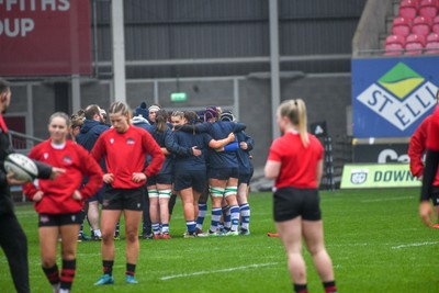 210226 - Brython Thunder v Wolfhounds - Celtic Challenge - Wolfhounds players huddle before their match against Brython Thunder