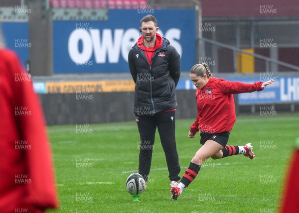 210226 - Brython Thunder v Wolfhounds - Celtic Challenge - Brython Thunders coach, Ashley Beck watches Hanna Marshall
