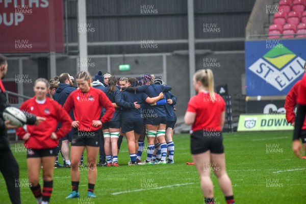 210226 - Brython Thunder v Wolfhounds - Celtic Challenge - Wolfhounds players huddle before their match against Brython Thunder
