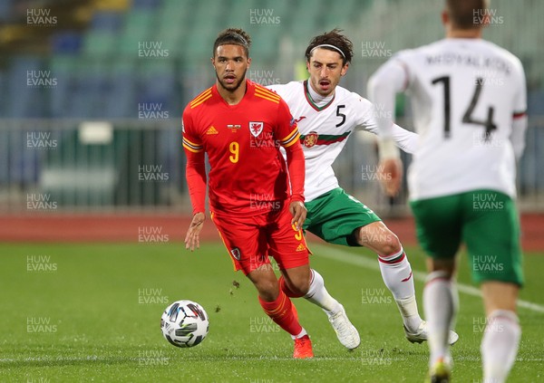 141020 - Bulgaria v Wales - UEFA Nations League - Tyler Roberts of Wales is challenged by Kristian Dimitrov of Bulgaria
