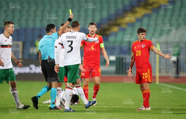 141020 - Bulgaria v Wales - UEFA Nations League - Daniel James of Wales is given a yellow card by referee Allyar Aghayev