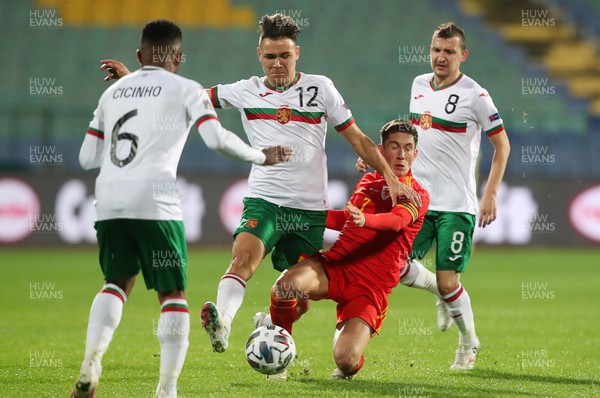 141020 - Bulgaria v Wales - UEFA Nations League - Yanis Karabelyod of Bulgaria is tackled by Harry Wilson of Wales