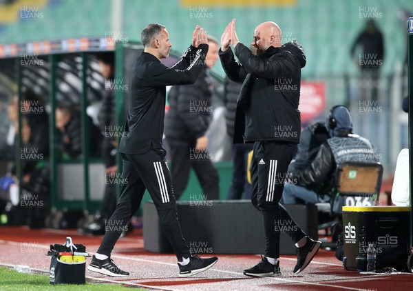 141020 - Bulgaria v Wales - UEFA Nations League - A happy Wales Manager Ryan Giggs celebrates with Robert Page after Wales win 1-0 in Bulgaria