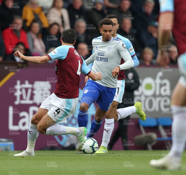 130419 - Burnley v Cardiff City - Premier League -  Josh Murphy of Cardiff tries to find a way through Jack Cork and Chris Wood of Burnley
