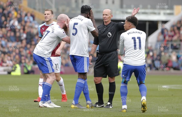 130419 - Burnley v Cardiff City - Premier League -  2nd penalty appeal not given to Cardiff as Referee Mike Dean closes his eyes to protests from Cardiff players