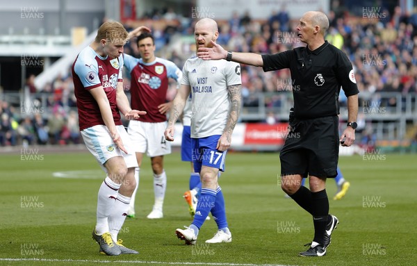 130419 - Burnley v Cardiff City - Premier League -  Referee Mike Dean awards a penalty to Cardiff against Ben Mee of Burnley but reversed the decision