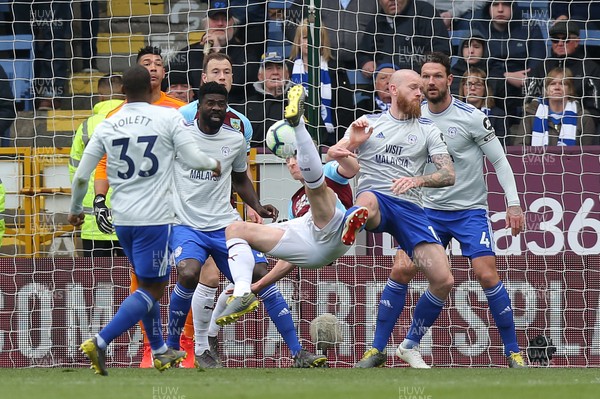 130419 - Burnley v Cardiff City - Premier League -  Ben Mee of Burnley tries an overhead kick at goal