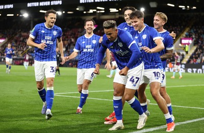 230925 - Burnley v Cardiff City - Carabao Cup Third Round - Callum Robinson of Cardiff cele on goal in 1st half with Rubin Colwill of Cardiff and Cian Ashford of Cardiff and team doing some kind of dance