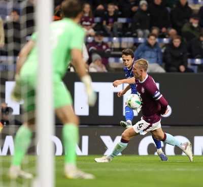 230925 - Burnley v Cardiff City - Carabao Cup Third Round - Perry Ng of Cardiff has a shot on goal in the 2nd half past Joe Worrall of Burnley