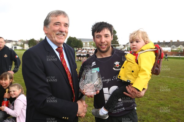 280418 - Bury Port RFC v Nantgaredig RFC - WRU League 3 West B -  Captain of Burry Port Andrew Francis and 2 year old son Bhodi receive the League 3 West B trophy from Anthony John of WRU  