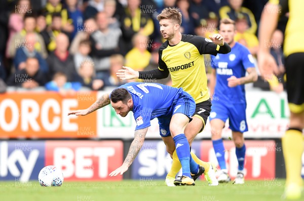 050817 - Burton Albion v Cardiff City - SkyBet Championship - Lee Tomlin of Cardiff City is tackled by Matthew Lund of Burton Albion