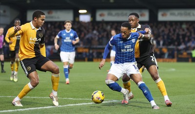 310126 - Burton Albion v Cardiff City - Sky Bet League 1 - Chris Willock of Cardiff tries to run through Udoka Godwin-Malife of Burton Albion and Toby Sibbick of Burton Albion