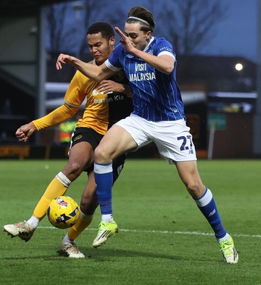 310126 - Burton Albion v Cardiff City - Sky Bet League 1 - Joel Colwill of Cardiff and Toby Sibbick of Burton Albion tussle in front of goal