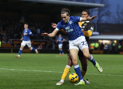 310126 - Burton Albion v Cardiff City - Sky Bet League 1 - Joel Colwill of Cardiff and Toby Sibbick of Burton Albion tussle in front of goal