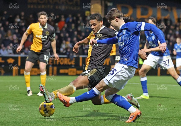 310126 - Burton Albion v Cardiff City - Sky Bet League 1 - Cian Ashford of Cardiff tries a shot on goal but is blocked by Kyran Lofthouse of Burton Albion