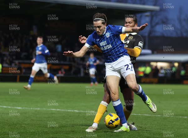 310126 - Burton Albion v Cardiff City - Sky Bet League 1 - Joel Colwill of Cardiff and Toby Sibbick of Burton Albion tussle in front of goal