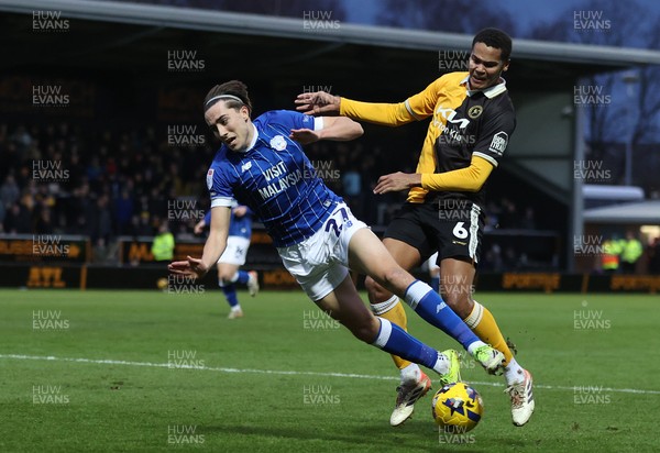 310126 - Burton Albion v Cardiff City - Sky Bet League 1 - Joel Colwill of Cardiff and Toby Sibbick of Burton Albion tussle in front of goal