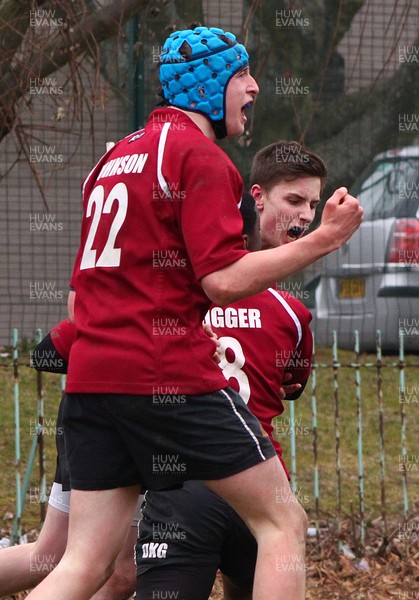 100413 - Caerleon Comprehensive V Cymer -Caerleon's Lewis Johnson, Dario Germain and Tom Attewell celebrate the try