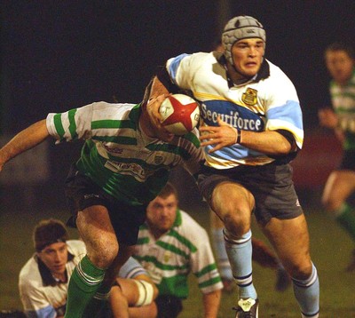 140203 - Caerphilly v Ebbw Vale - Welsh Premiership - Ebbw Vale's Kati Tuipuloto breaks through the Caerphilly defence