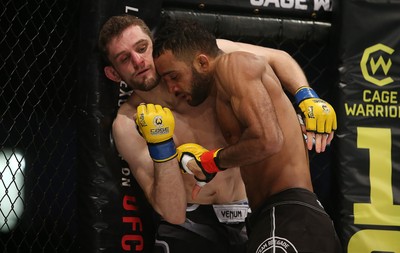 081218 - Cage Warriors 100 - Joe McColgan (left) v Jai Herbert (right) during their lightweight fight