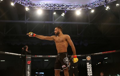 081218 - Cage Warriors 100 - Jai Herbert celebrates beating Joe McColgan during their lightweight fight