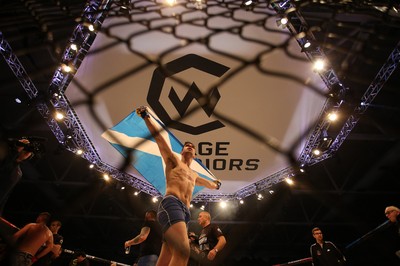 081218 - Cage Warriors 100 - Aidan Stephen celebrates his win over Wales' Kris Edwards