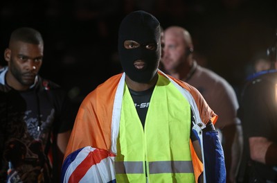 081218 - Cage Warriors 100 - Alex Lohore enters the arena for his fight with Tim Barnett