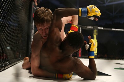 091218 - Cage Warriors 100 - Wales' Jack Shore dominates Mike Ekundayo during their Bantamweight title fight