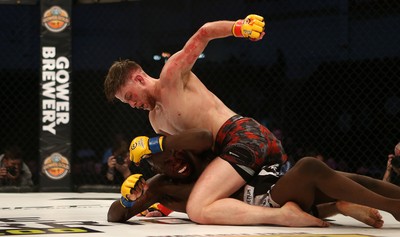 091218 - Cage Warriors 100 - Wales' Jack Shore dominates Mike Ekundayo during their Bantamweight title fight