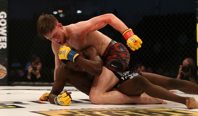 091218 - Cage Warriors 100 - Wales' Jack Shore dominates Mike Ekundayo during their Bantamweight title fight