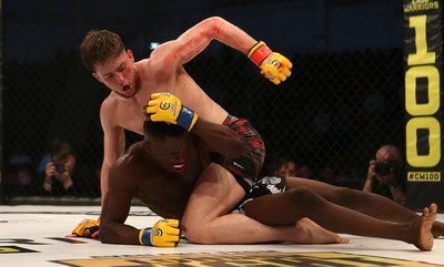 091218 - Cage Warriors 100 - Wales' Jack Shore dominates Mike Ekundayo during their Bantamweight title fight