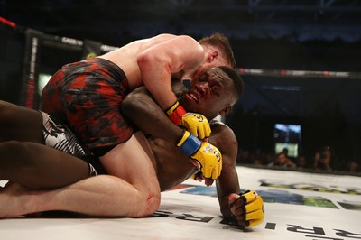 091218 - Cage Warriors 100 - Wales' Jack Shore dominates Mike Ekundayo during their Bantamweight title fight