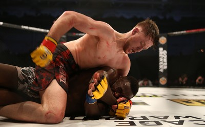 091218 - Cage Warriors 100 - Wales' Jack Shore dominates Mike Ekundayo during their Bantamweight title fight