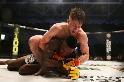 091218 - Cage Warriors 100 - Wales' Jack Shore dominates Mike Ekundayo during their Bantamweight title fight