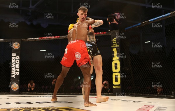 081218 - Cage Warriors 100 - Rhys McKee (Black shorts) v Jefferson George (Red shorts) during their lightweight fight