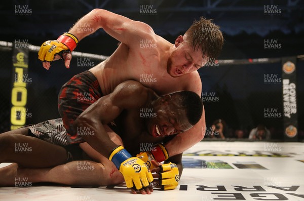 091218 - Cage Warriors 100 - Wales' Jack Shore dominates Mike Ekundayo during their Bantamweight title fight