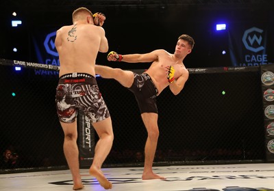 290918 - Cage Warriors 97 - Luke Shanks v Jason Jenkins (Ebbw Vale) - Jenkins gets a kick in