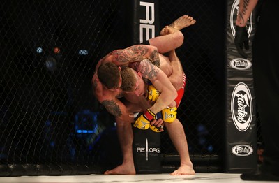 290918 - Cage Warriors 97 - Michael Corston (Black Shorts) v Struan Croxton, Port Talbot (Black and Red shorts) - Corston gets a hold of Croxton