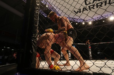 290918 - Cage Warriors 97 - Michael Corston (Black Shorts) v Struan Croxton, Port Talbot (Black and Red shorts) - 