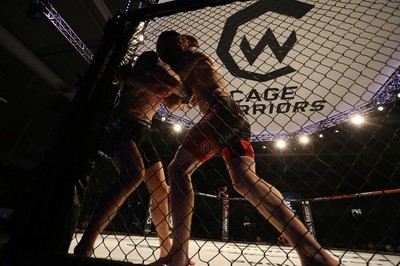 290918 - Cage Warriors 97 - Michael Corston (Black Shorts) v Struan Croxton, Port Talbot (Black and Red shorts) - 