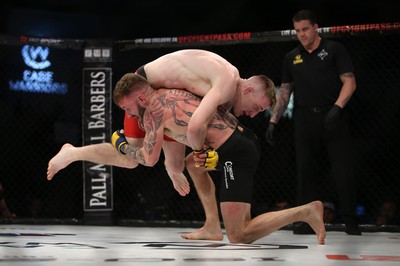 290918 - Cage Warriors 97 - Michael Corston (Black Shorts) v Struan Croxton, Port Talbot (Black and Red shorts) - 