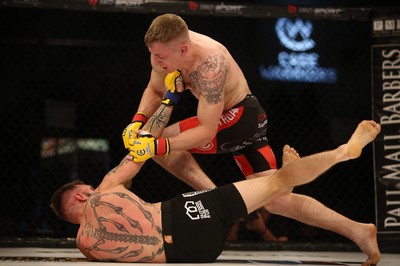 290918 - Cage Warriors 97 - Michael Corston (Black Shorts) v Struan Croxton, Port Talbot (Black and Red shorts) - 