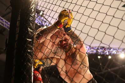 290918 - Cage Warriors 97 - Michael Corston (Black Shorts) v Struan Croxton, Port Talbot (Black and Red shorts) - 