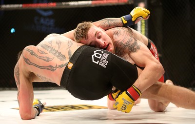 290918 - Cage Warriors 97 - Michael Corston (Black Shorts) v Struan Croxton, Port Talbot (Black and Red shorts) - 