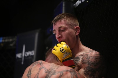 290918 - Cage Warriors 97 - Michael Corston (Black Shorts) v Struan Croxton, Port Talbot (Black and Red shorts) - 