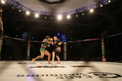 290918 - Cage Warriors 97 - Cory McKenna (Black Top) v Micol DiSegni (Green) - 