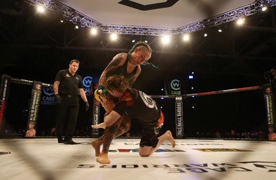 290918 - Cage Warriors 97 - Cory McKenna (Black Top) v Micol DiSegni (Green) - 